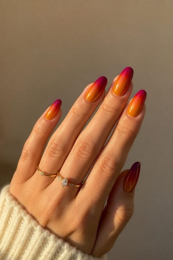 29 Pool Party Nails 2026: Fun, Colorful Designs for Summer Vibes sunset-aura-nails