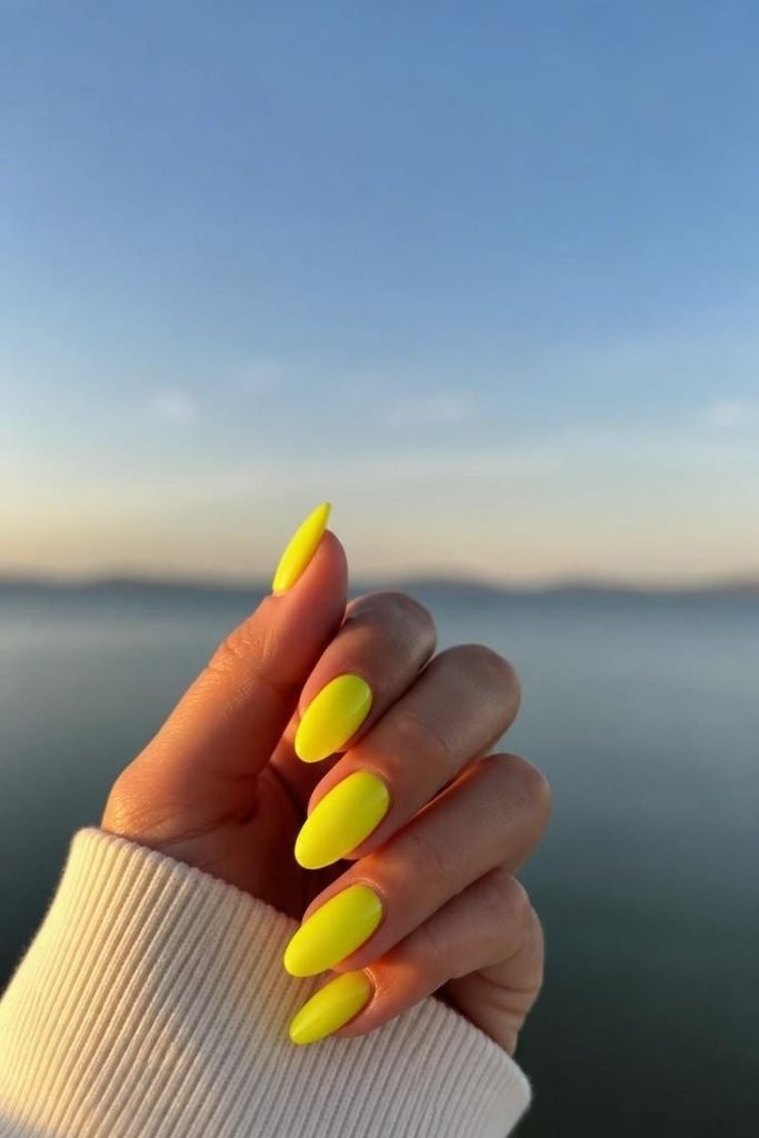 30 Neon Summer Nails 2026: Bold, Bright & Colorful Designs to Light Up Your Look neon-yellow-nails