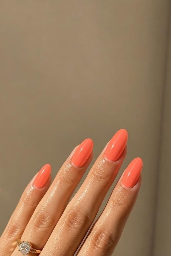 30 Neon Summer Nails 2026: Bold, Bright & Colorful Designs to Light Up Your Look neon-coral-nails