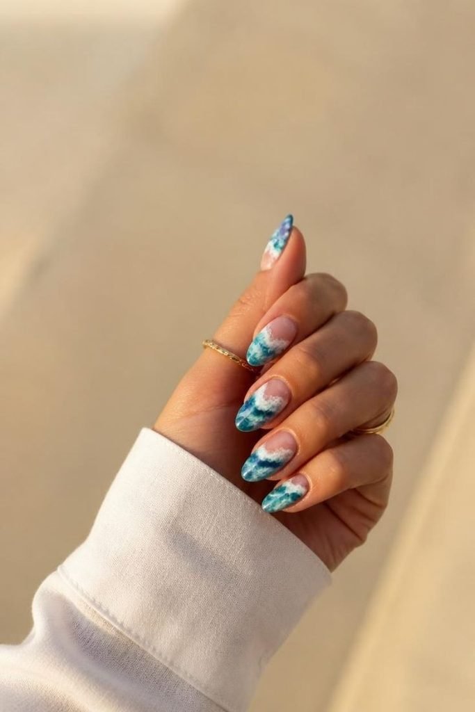 29 Pool Party Nails 2026: Fun, Colorful Designs for Summer Vibes ocean-wave-nails