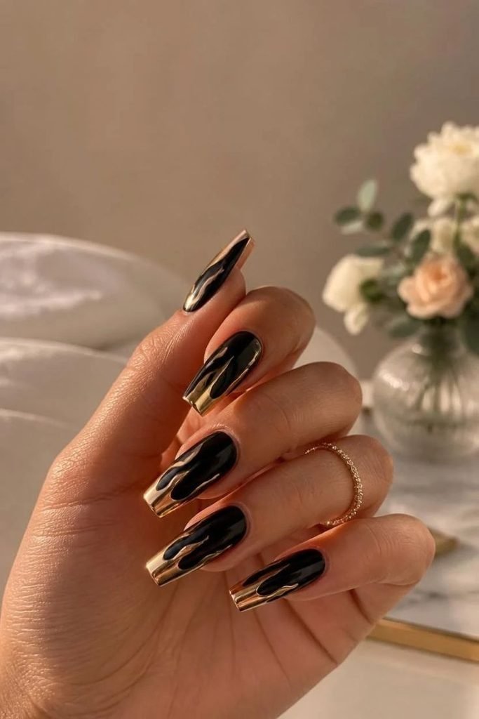 black-and-gold-chrome-nails