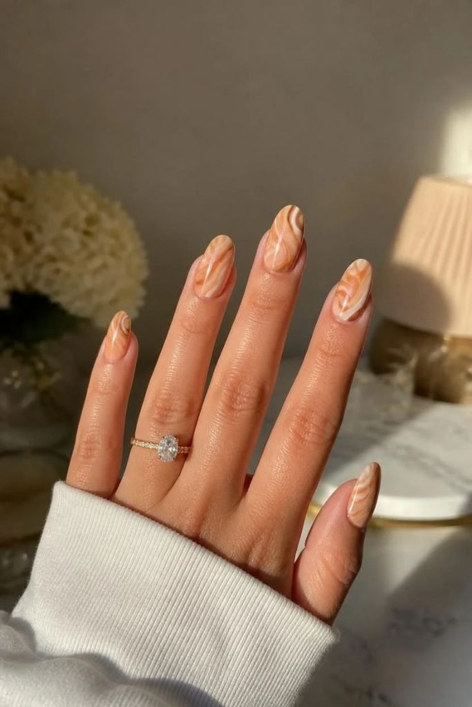 29 Best Cozy Fall Nail Ideas 2026: Chic, Warm & Trendy Autumn Manicures caramel-and-cream-swirl-nails