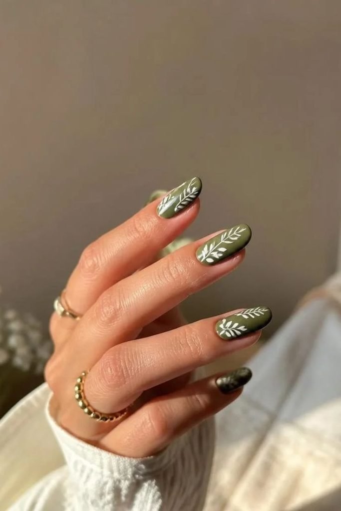 white-leaves-on-olive-green-nails